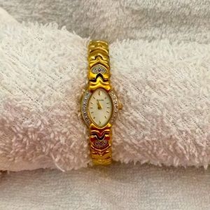Bulova Gold tone diamond link watch